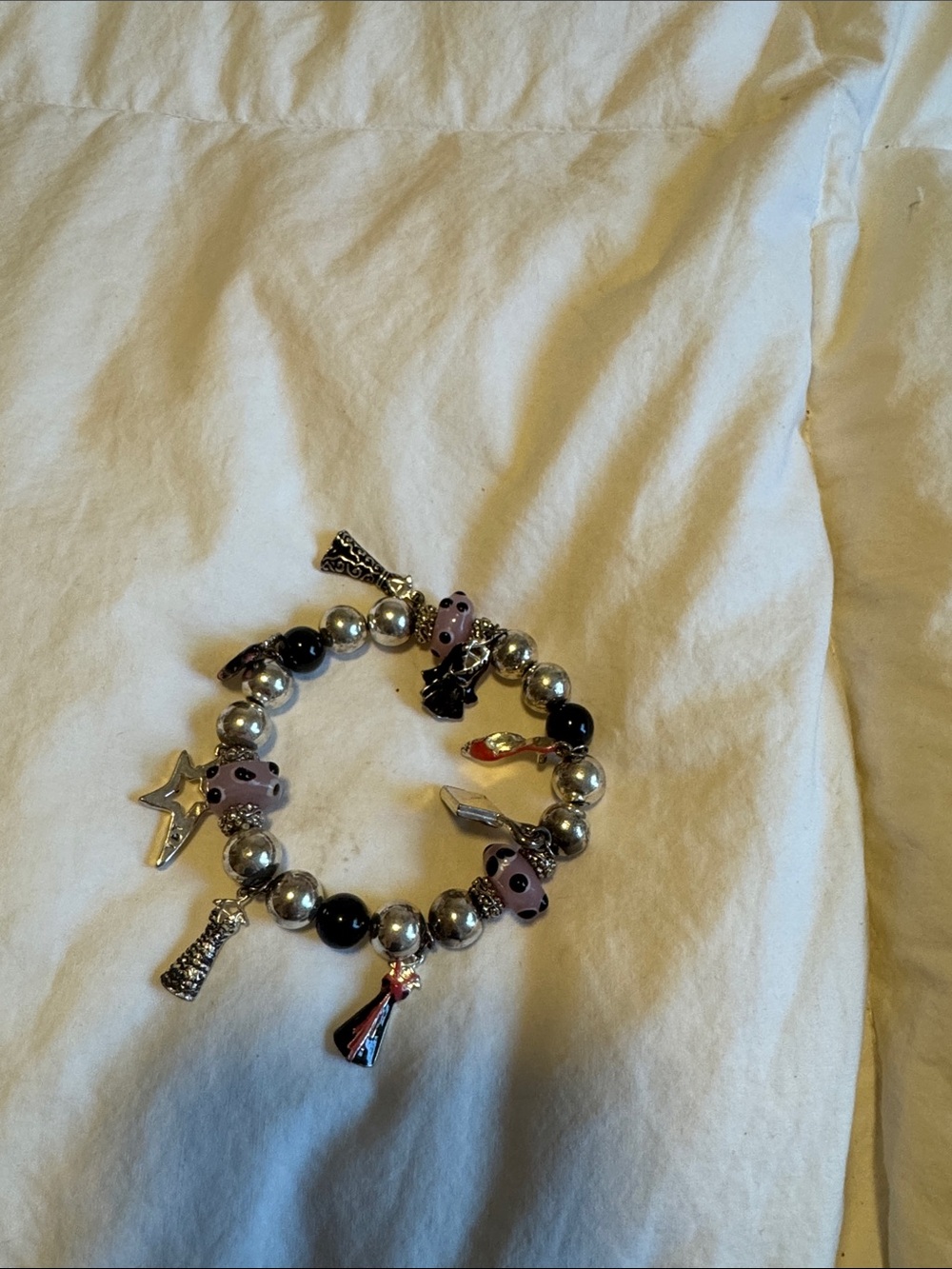 Silver Bead Charm Bracelet with Pink and Black Accents